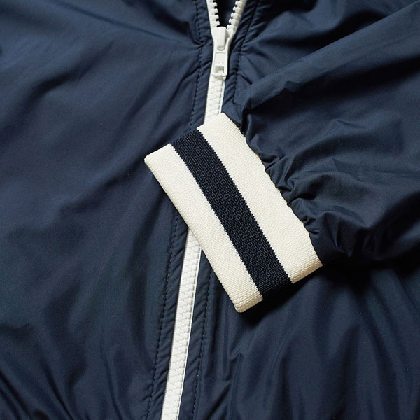 Weller wore: Maison Kitsune Tricolour Windbreaker